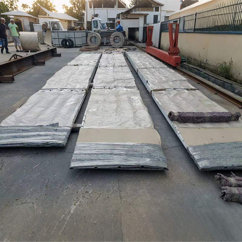 What are the environmental impacts of producing and recycling colored steel plates