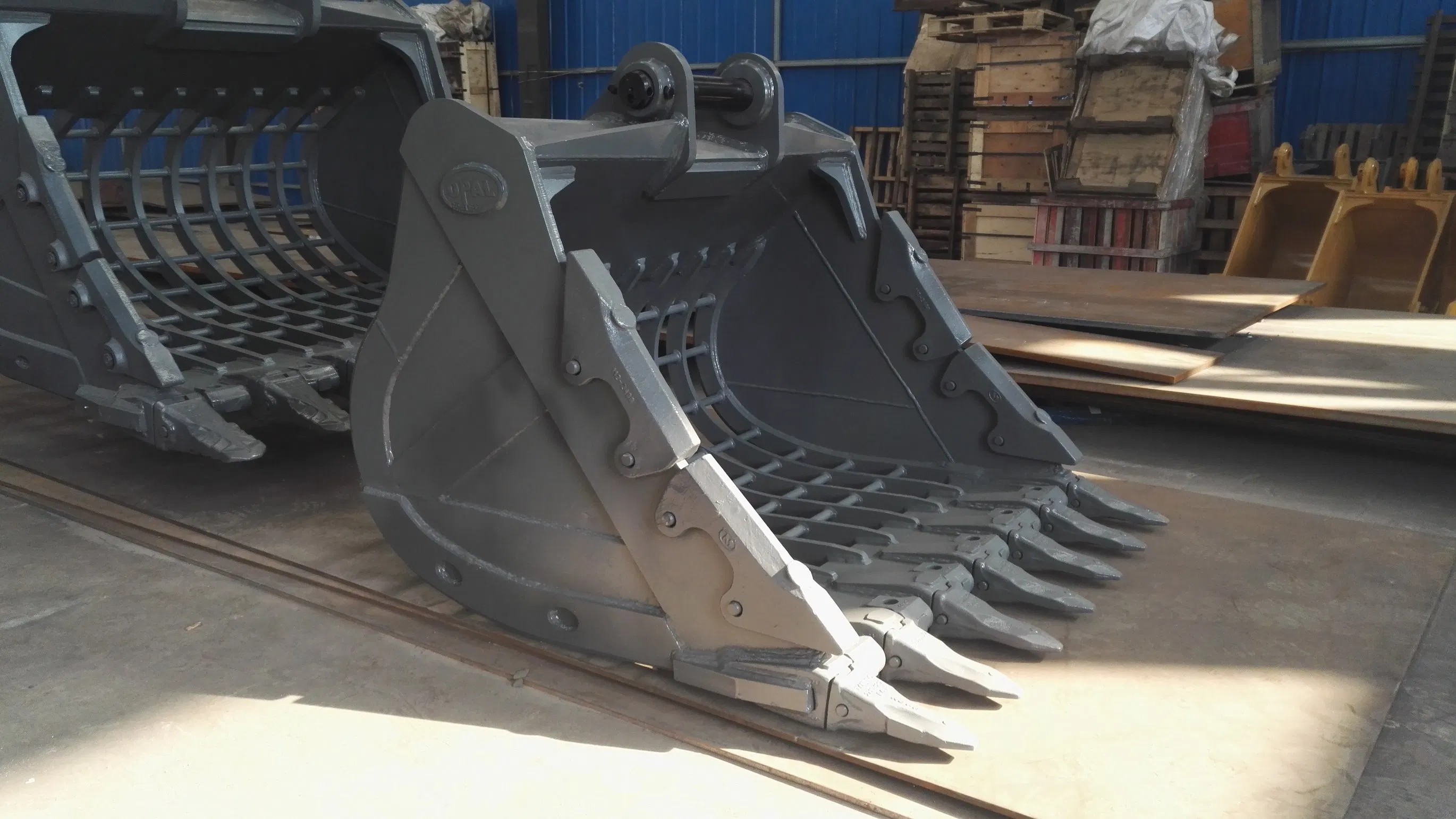 Hot Sale Skid Steer Loader Attachment Skeleton Rake Bucket on Mini Digger